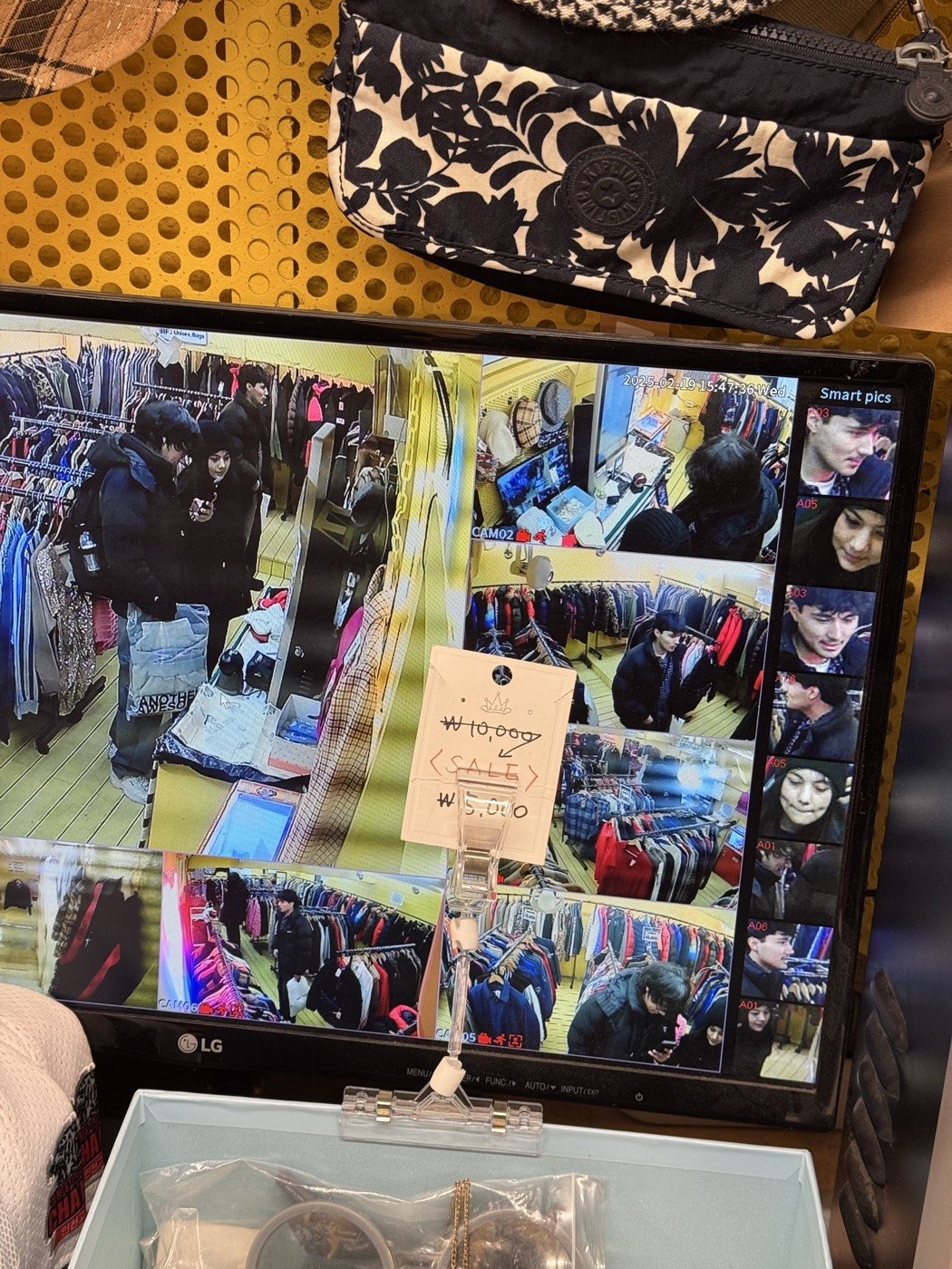 A shop display of photos, stickers, and keepsakes