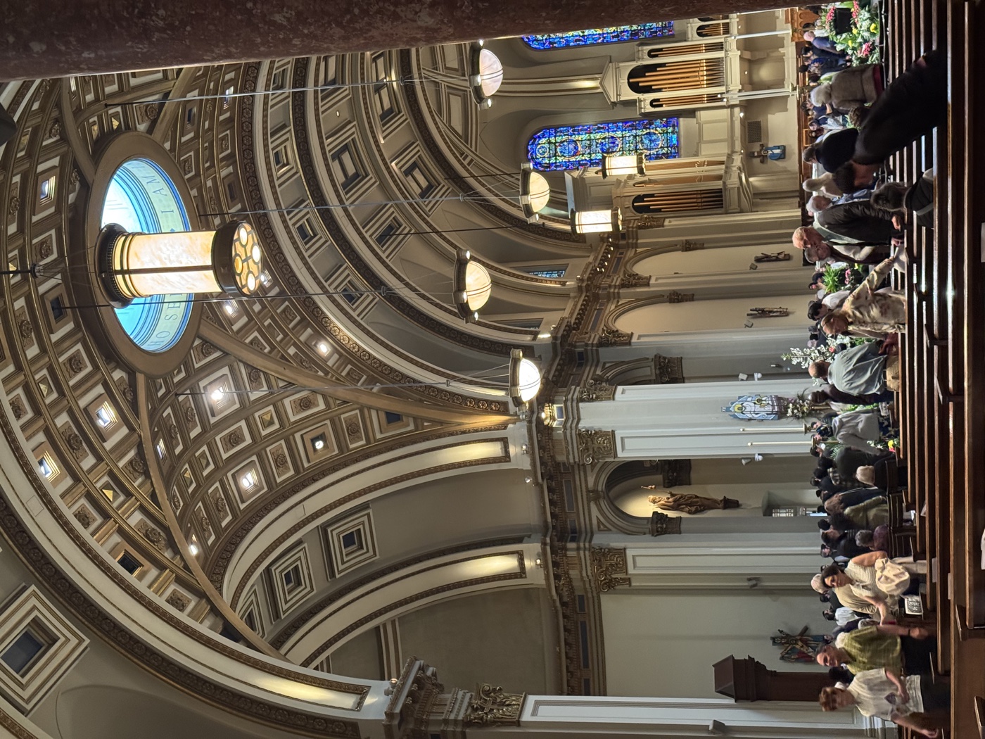 The ornate interior of a Seattle church during a gathering
